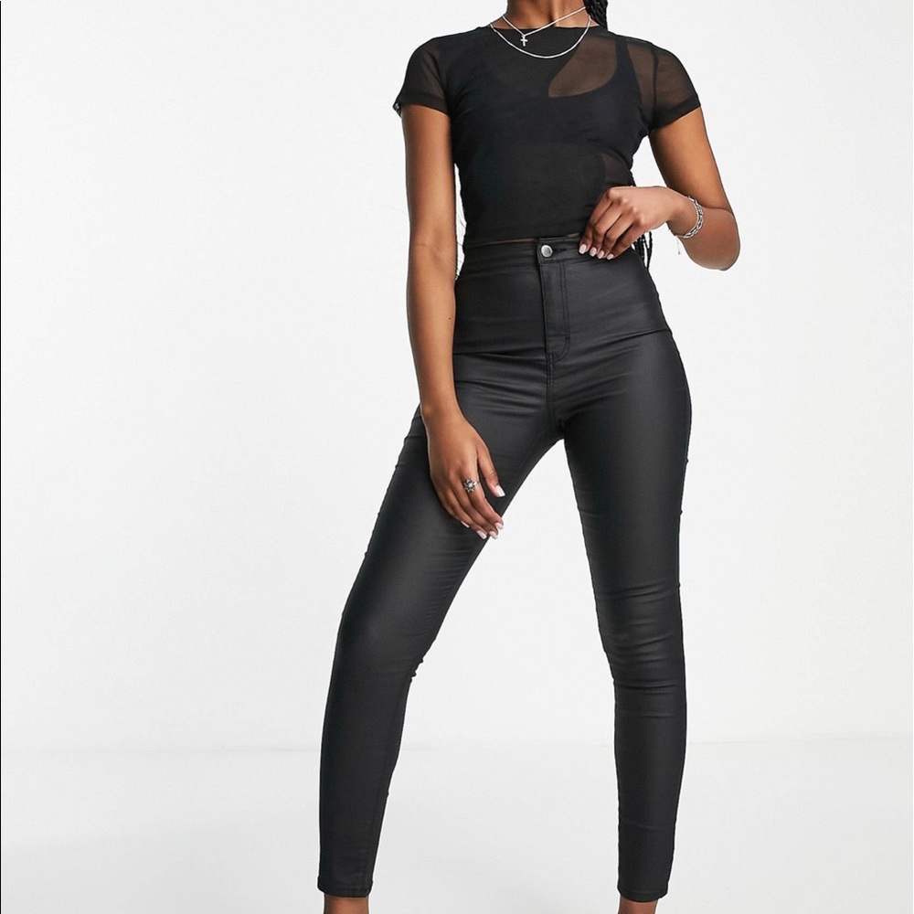 Topshop Joni Jean in black coated denim. Size w28.